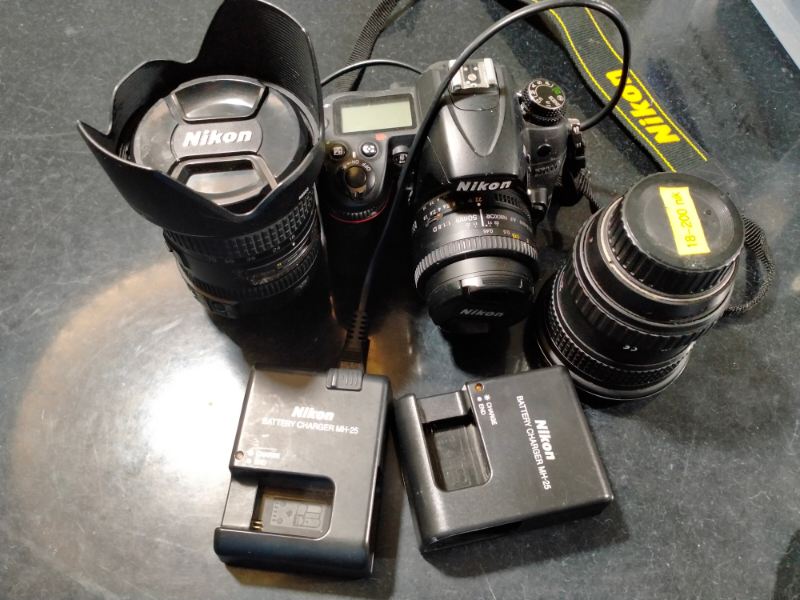 Image: A collection of Nikon cameras including D7000,